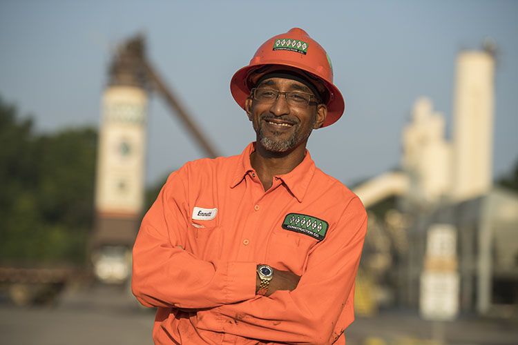 Emmitt Hall, a highway construction worker, smiles because he loves his construction career in Georgia