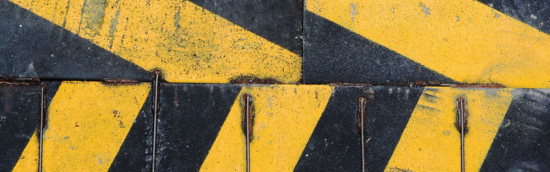 A  yellow and black painted road was built by a Georgia road construction company