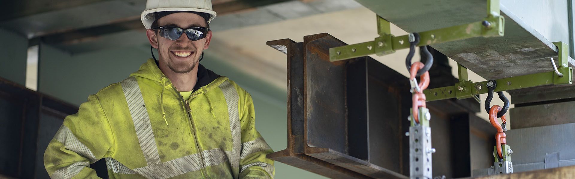 A Georgia construction worker smiling on site in his Georgia construction career 