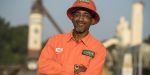 Emmitt Hall, a highway construction worker, smiles because he loves his construction career in Georgia