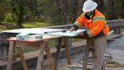 A bridge carpenter in Georgia works on site of his road construction career in Georgia