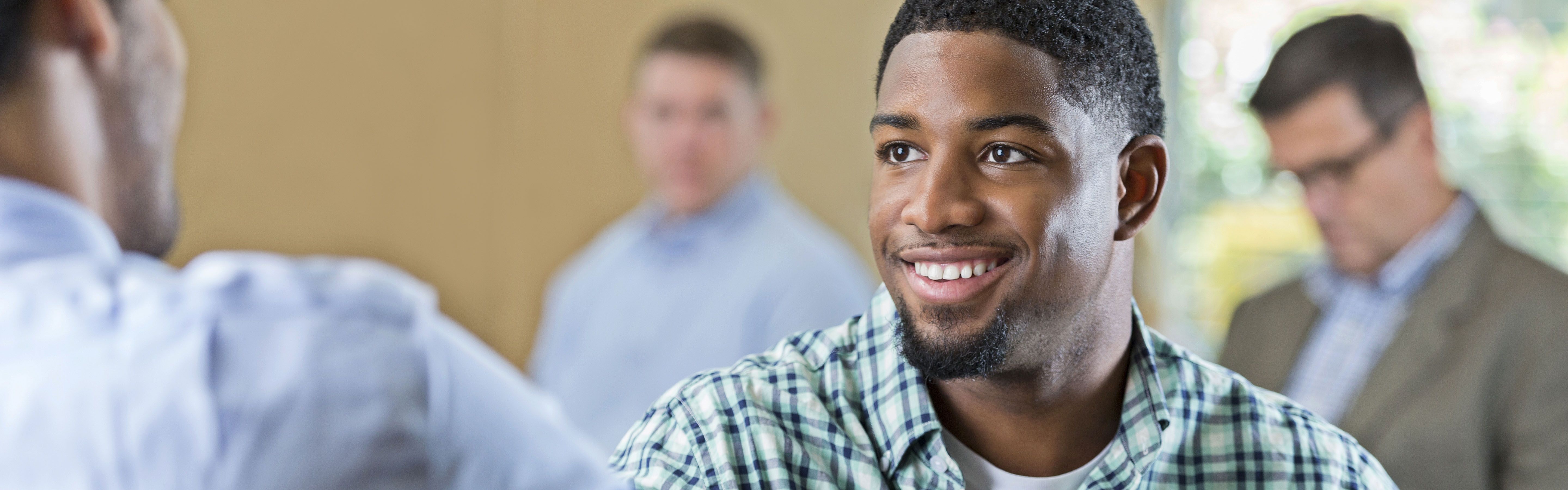 Man smiling during his job search for Georgia construction careers 