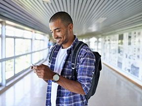 A young man smiles while applying to a road construction career in Georgia 