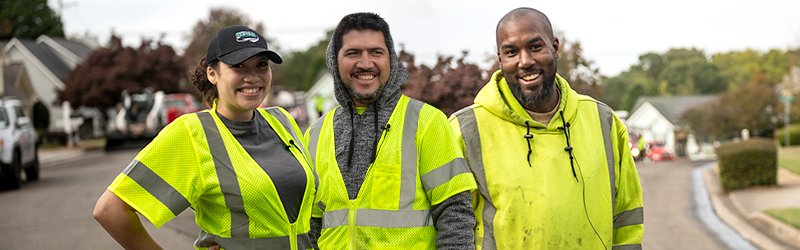 3 Georgia Highway road workers smiling