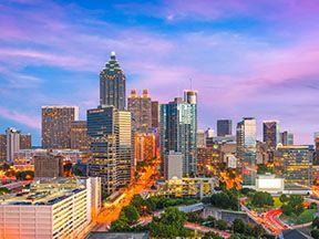 skyline of metro Atlanta, an area where highway contractors are hiring for road construction jobs