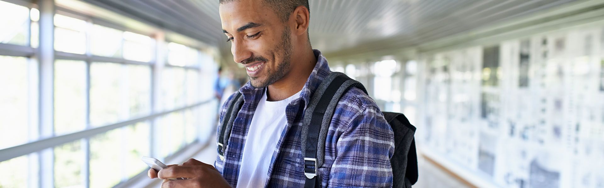 Young man smiles while applying to road construction job in Georgia 